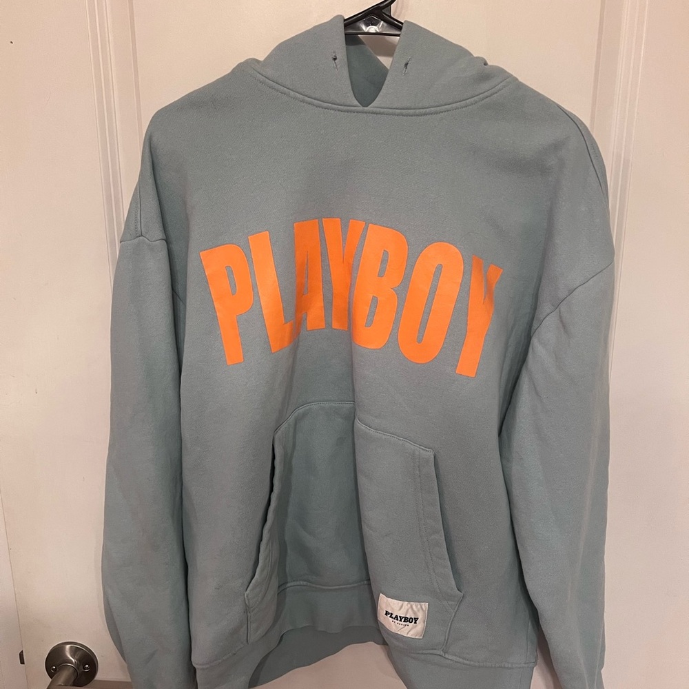 Playboy Hoodie with Vibrant Orange Logo